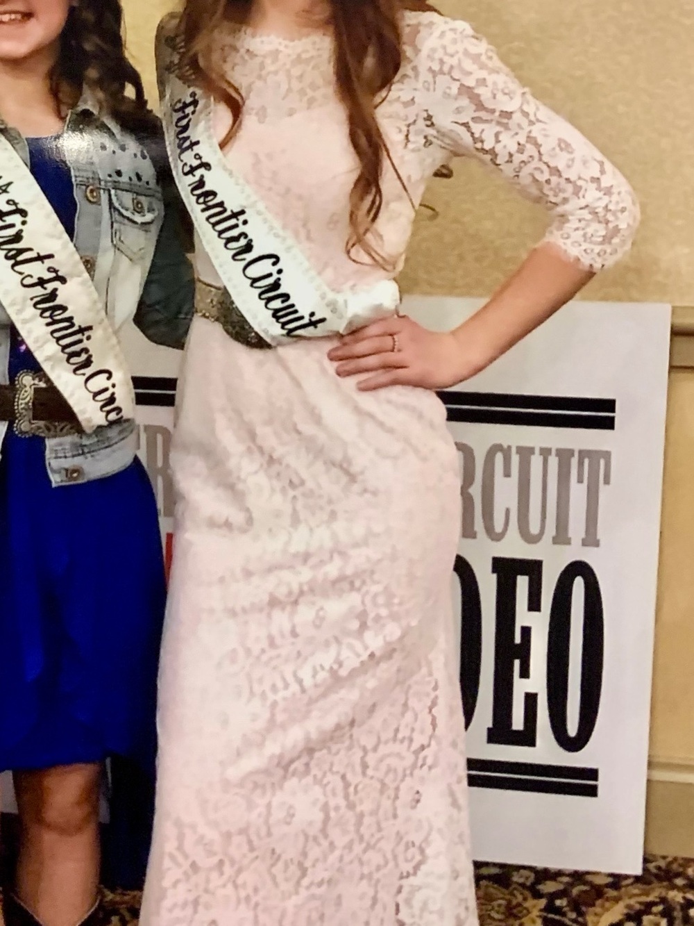 Christina Wu floor length white lace gown with pink lining